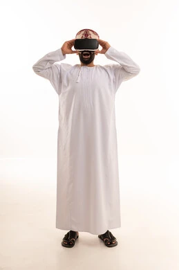 Omani Man in Traditional Dress Using VR Headset