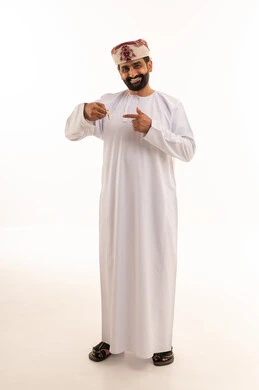 Omani Man Holding House Key on White Background