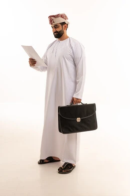Omani Businessman with Briefcase and Documents