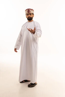 Omani Man in Traditional Dishdasha Standing in Studio