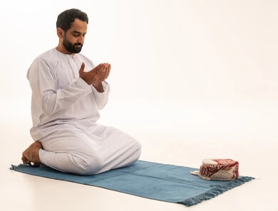 Emirati Man Praying Supplication on White Background