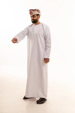Omani Man in Traditional Dress Pointing Downward