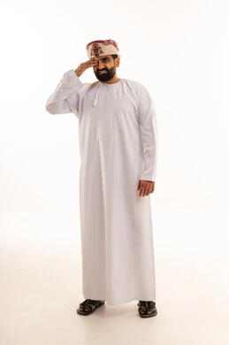 Omani Man Saluting in Traditional White Dishdasha
