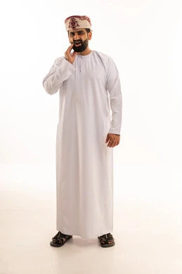 Omani Man in Traditional Dress with Toothache Pain