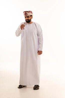 Omani Man in Traditional Dishdasha and Kumma