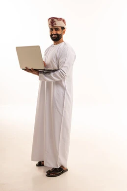 Omani Man Holding Laptop on White Background
