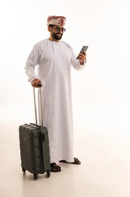 Omani Man with Suitcase and Smartphone on White Background