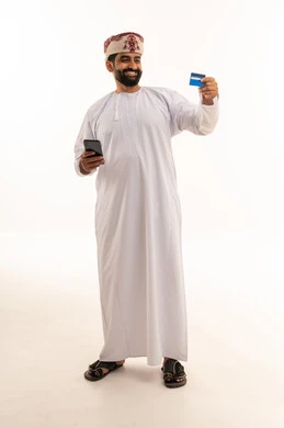 Omani Man with Credit Card and Smartphone