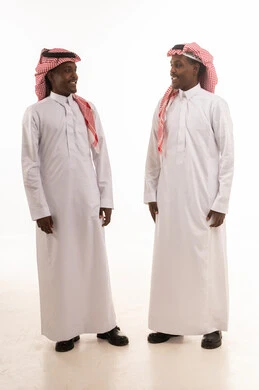 Two Saudi Men in Traditional Thobe and Shemagh