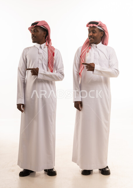 Saudi Men in Traditional Thobes Pointing on White