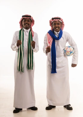 Saudi Men Football Fans Celebrating with Soccer Ball