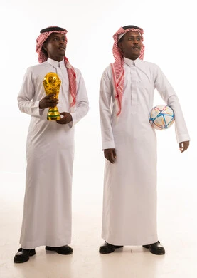 Saudi Men with Trophy and Football on White Background