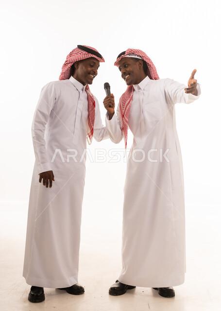 Saudi Men in Traditional Dress with Microphone