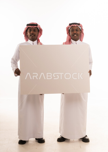 Two Saudi Men Holding Blank White Board in Studio