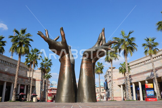 Statue of four arms decorated with henna, India Gate area in Riverland Dubai, a masterpiece of Indian civilization, recreational areas in Dubai, tourist places in the Emirates