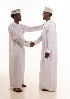 Omani Men Handshake in Traditional Dress