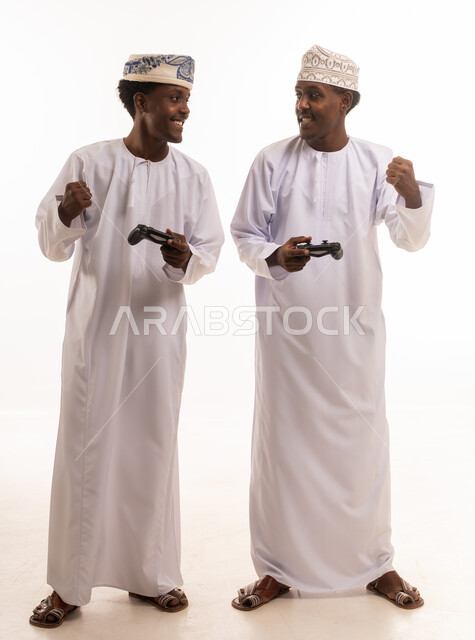 Omani Men Playing Video Games in Studio