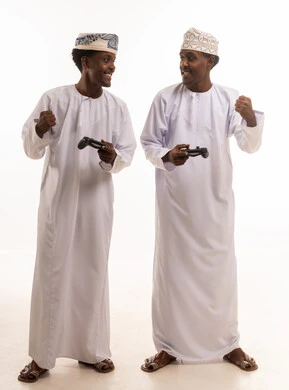 Omani Men Playing Video Games in Studio