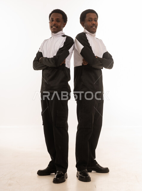 Omani Men in Athletic Jackets in Studio