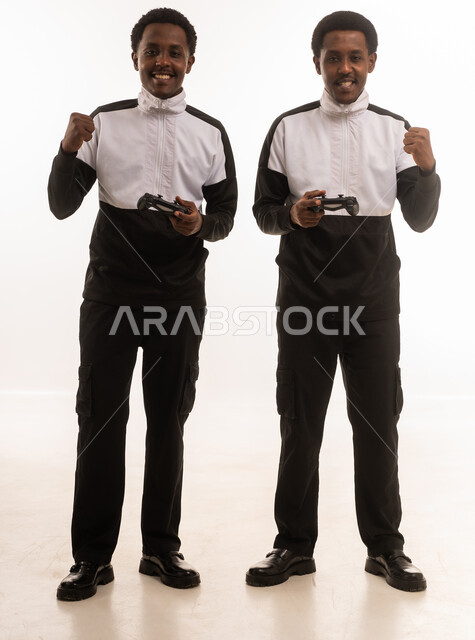Omani Men with Gaming Controllers in Studio
