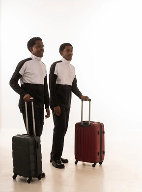 Omani Men with Suitcases on White Background