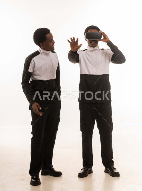 Omani Men Using Virtual Reality VR Headset Studio