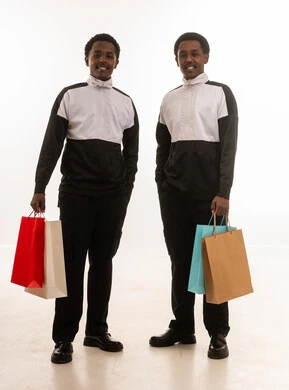 Omani Men Holding Shopping Bags in Studio