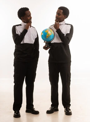 Omani Men Holding Globe Earth Model in White Studio
