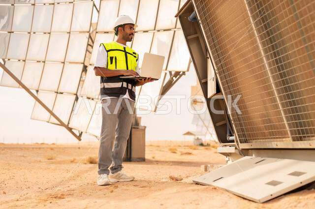 Saudi Engineer at Solar Power Station in Desert
