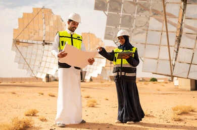 Saudi Engineers Reviewing Plans at Desert Solar Farm