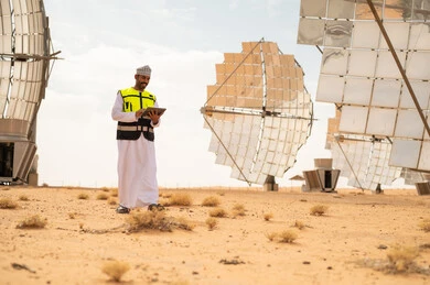 Omani Engineer Working at Desert Solar Power Plant