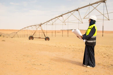 Arab Female Engineer at Desert Irrigation Site