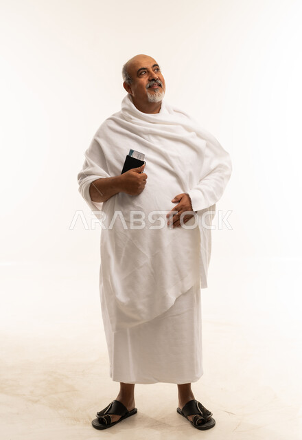 Saudi Senior Pilgrim in Ihram with Passport