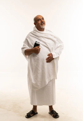 Saudi Senior Pilgrim in Ihram with Passport