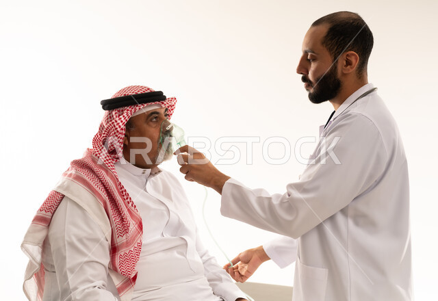 Saudi Doctor Adjusting Oxygen Mask on Elderly Patient