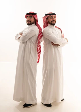 Two Saudi Men in Traditional Dress Studio Portrait