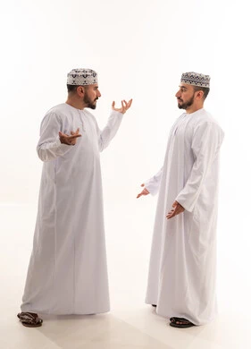 Omani Men in Traditional Dress Talking in Studio