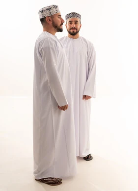 Omani Men in Traditional Dishdasha on White Background