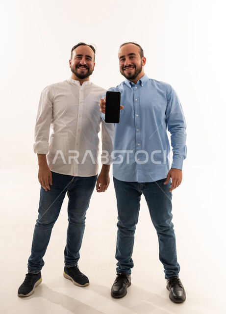 Saudi Men Holding Smartphone Blank Screen Display