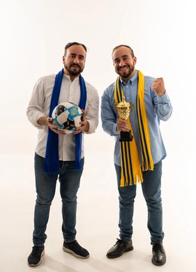 Saudi Men Football Fans with Trophy and Soccer Ball