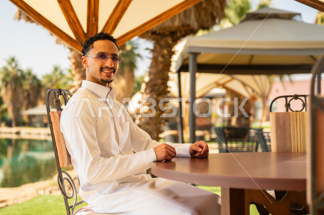 Saudi Man in White Thobe at Luxury Resort
