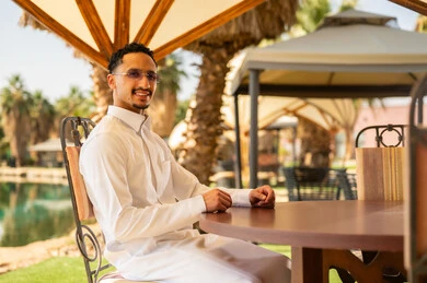 Saudi Man in White Thobe at Luxury Resort