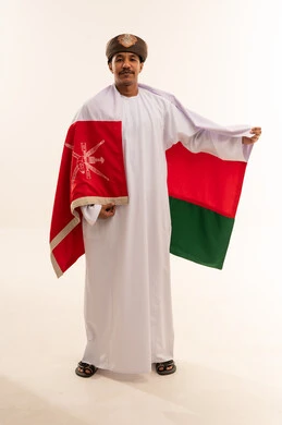 Omani Man Wearing National Flag in Studio Portrait