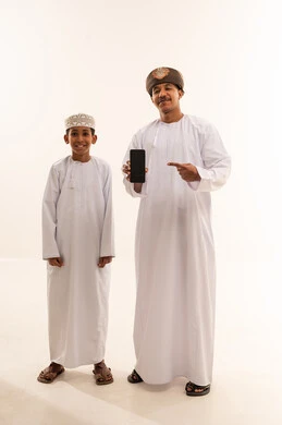 Omani Man and Boy with Smartphone in Studio