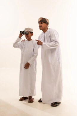 Omani Man and Boy with Binoculars in Studio
