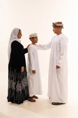 Omani Family in Traditional Dress on White Background