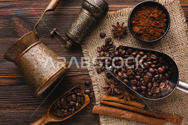 Close-up of dark coffee beans in the metal arm, coffee makers, coffee making, dark coffee beans, hot drinks