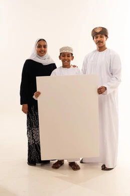 Omani Family Holding Blank White Board in Studio