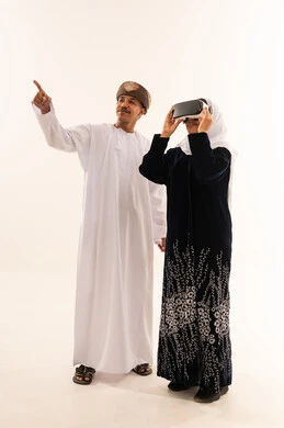 Omani Man and Woman Using VR Headset Technology