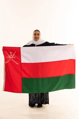 Omani Woman Holding Oman National Flag on White Background